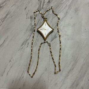 VTG SAXONY SWISS SHOCK RESISTANT DIAMOND SHAPED PENDANT WIND UP WATCH ON A CHAIN